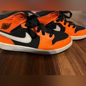 Orange and black Jordan 1s